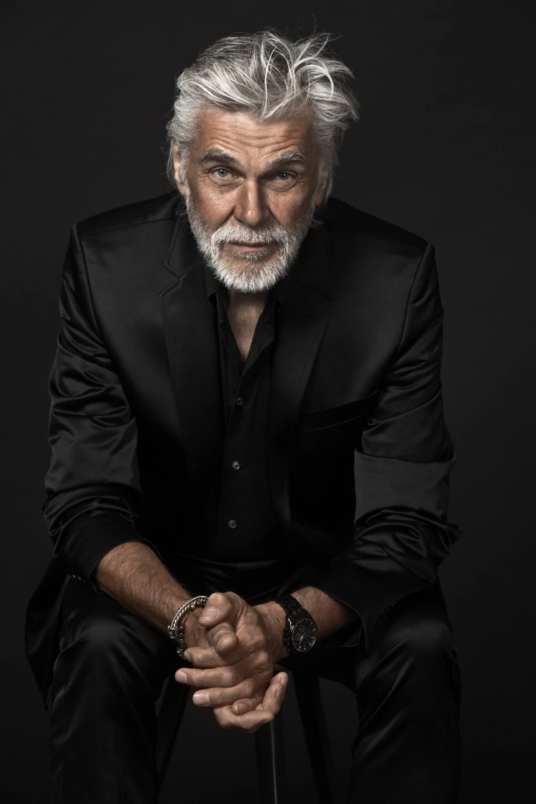 Male in her 60s happily enjoying retirement