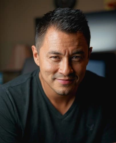 Man in mid 40s Smiling and having a positive attitude